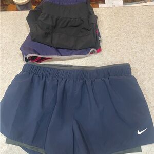 Nike Navy Blue Women's Athletic Shorts with White Swoosh